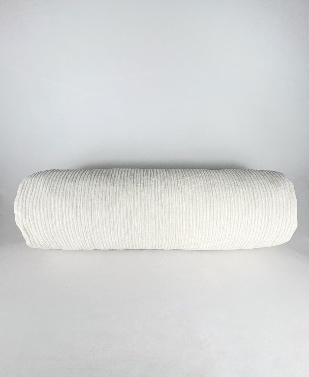 Cojín tubular color blanco
