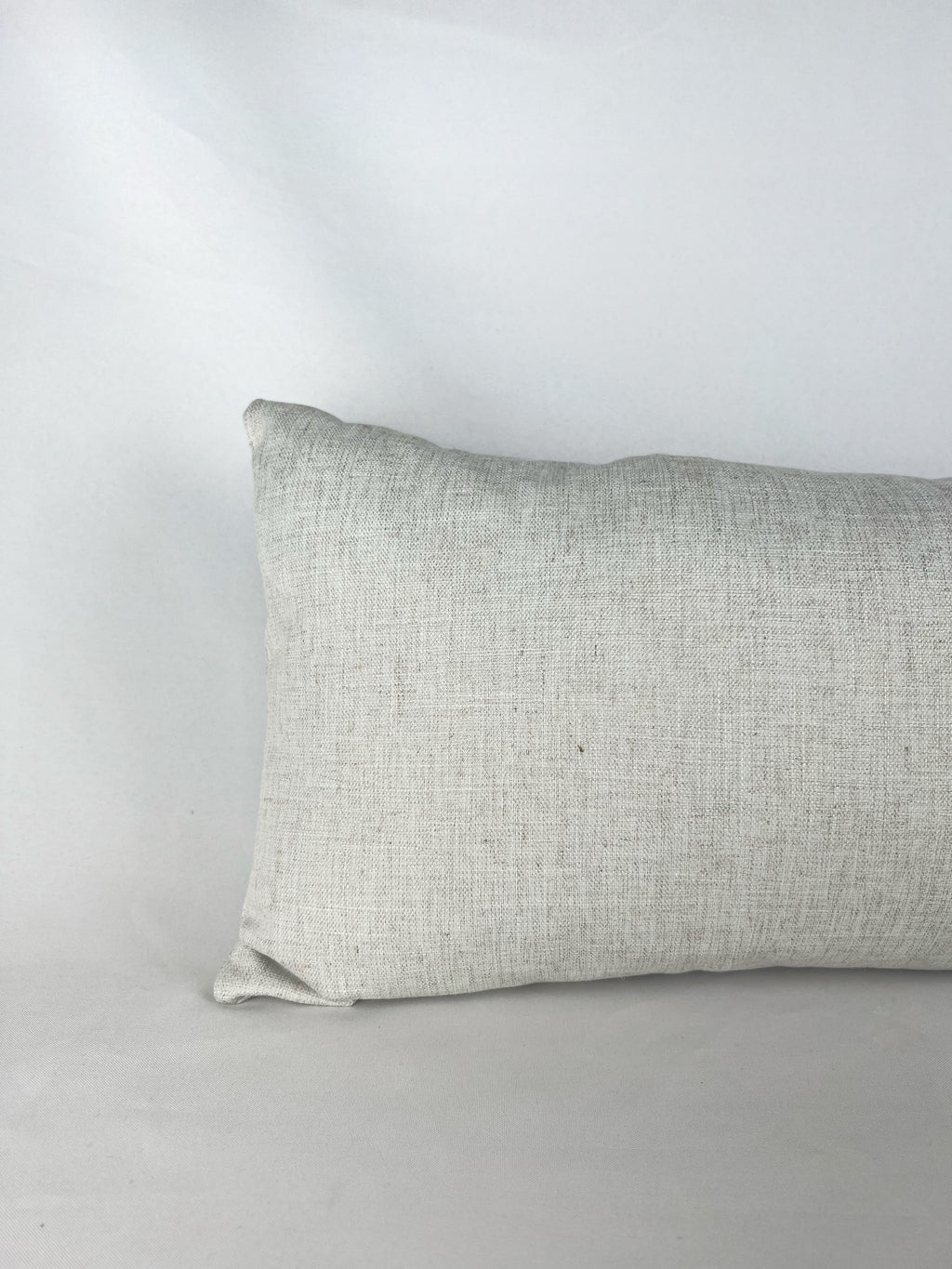 Cojín rectangular color beige claro